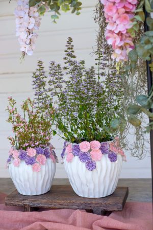 WHITE POT WITH PINK AND  PURPLE FLOWER RIM SMALL