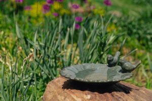 GREEN CERAMIC BIRD BATH WITH  THREE BIRDS