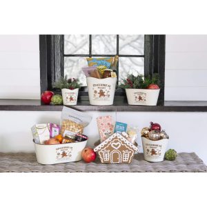 BROWN METAL GINGERBREAD HOUSE PACKER