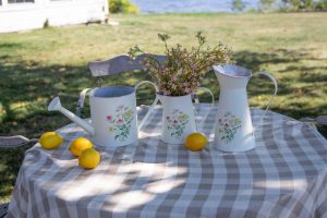 METAL PITCHER WITH FLORAL EMBOSS DESIGN