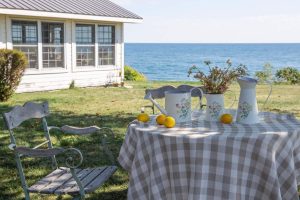METAL PITCHER WITH FLORAL EMBOSS DESIGN