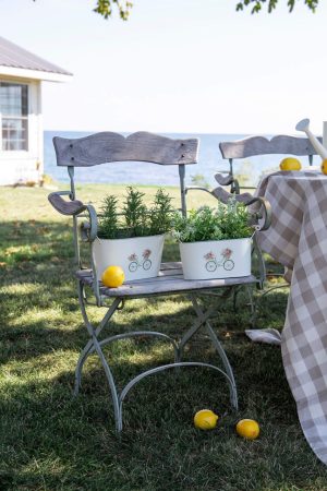 SMALL OVAL METAL WITH BICYCLE EMBOSS DESIGN