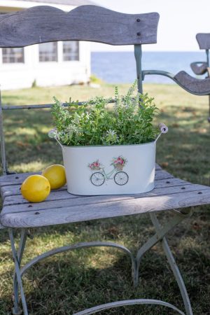 SMALL OVAL METAL WITH BICYCLE EMBOSS DESIGN